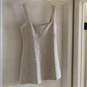 Elegant Cream Sleeveless Dress with Pearl Accents